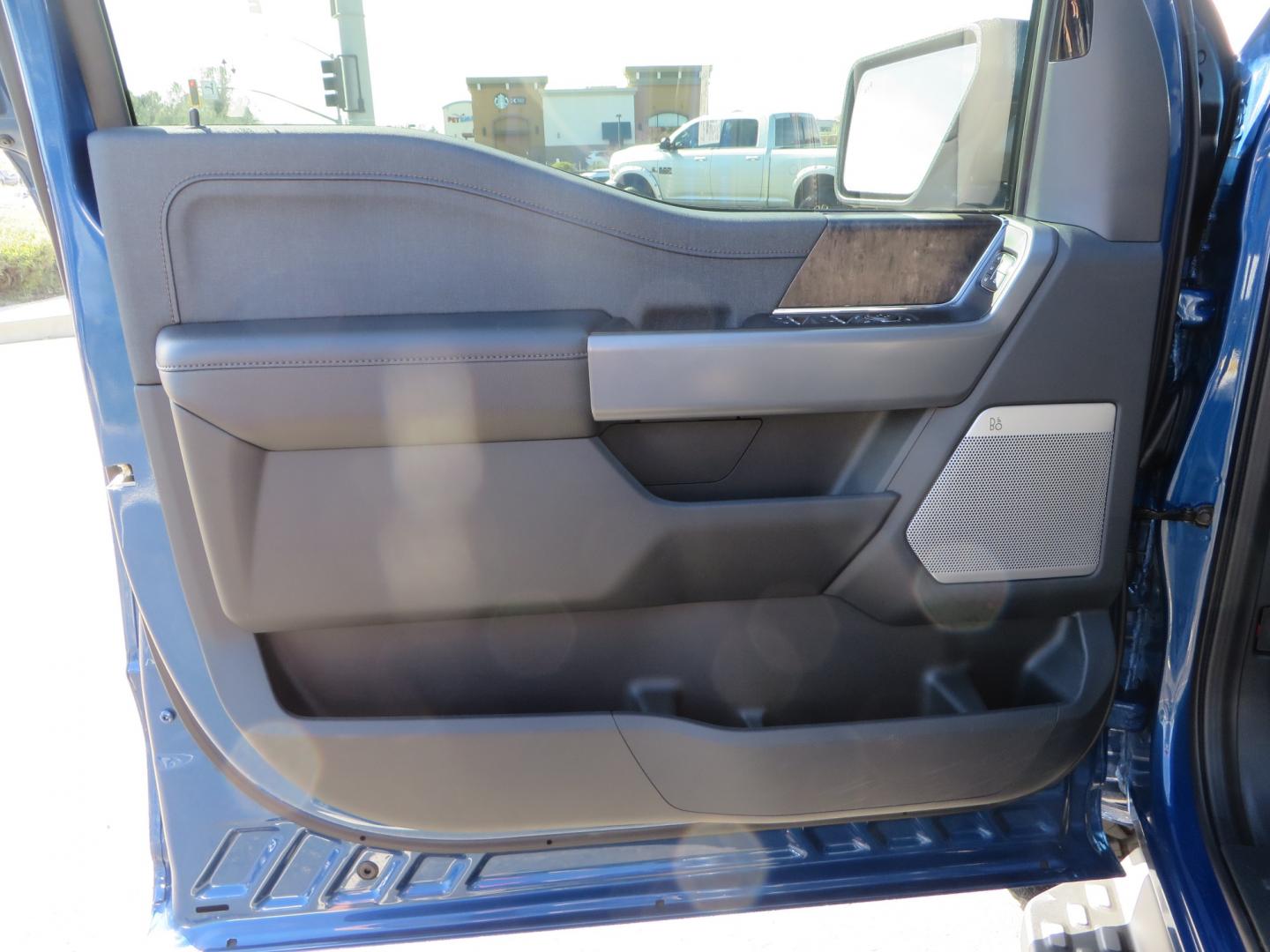 2022 BLUE /BLACK Ford F-150 Lariat Crew Cab 4WD (1FT6W1EV6NW) , located at 2630 Grass Valley Highway, Auburn, CA, 95603, (530) 508-5100, 38.937893, -121.095482 - Tired of gas prices and still want to look cool? Check out this Ford Lightning featuring a RC level kit, Nitto Ridge Grappler tires, Fuel Rebel wheels, Sinister front and rear bumpers, Baja Designs leds, Rigid Industries Leds, Bakflip F1, and window tint. - Photo#29